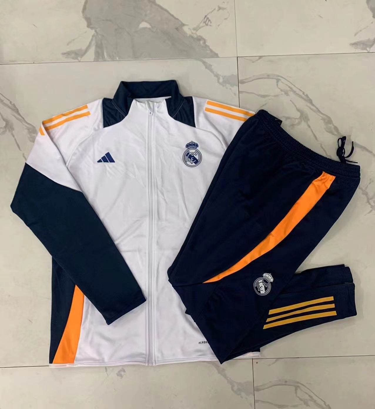 CONJUNTO LARGO REAL MADRID I 24/25 HOMBRE - ZonaCamisetas
