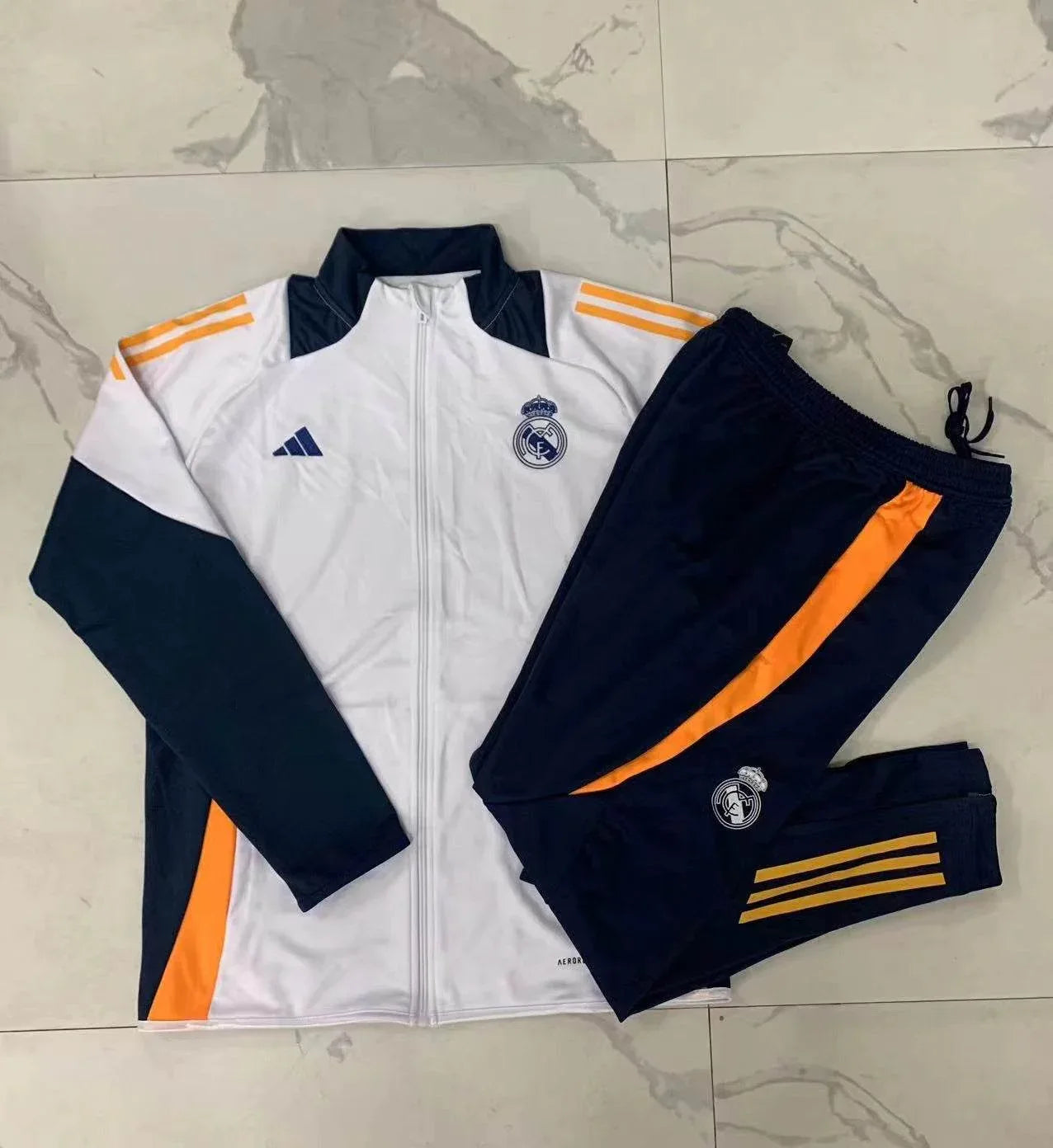 CONJUNTO LARGO REAL MADRID I 24/25 HOMBRE - ZonaCamisetas