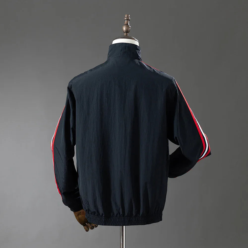 CORTAVIENTO MANCHESTER UNITED I REVERSIBLE 2025 - ZonaCamisetas