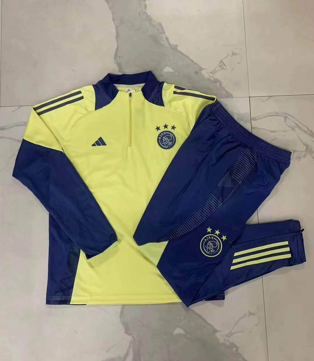 CONJUNTO LARGO AJAX lI 24/25 HOMBRE - ZonaCamisetas