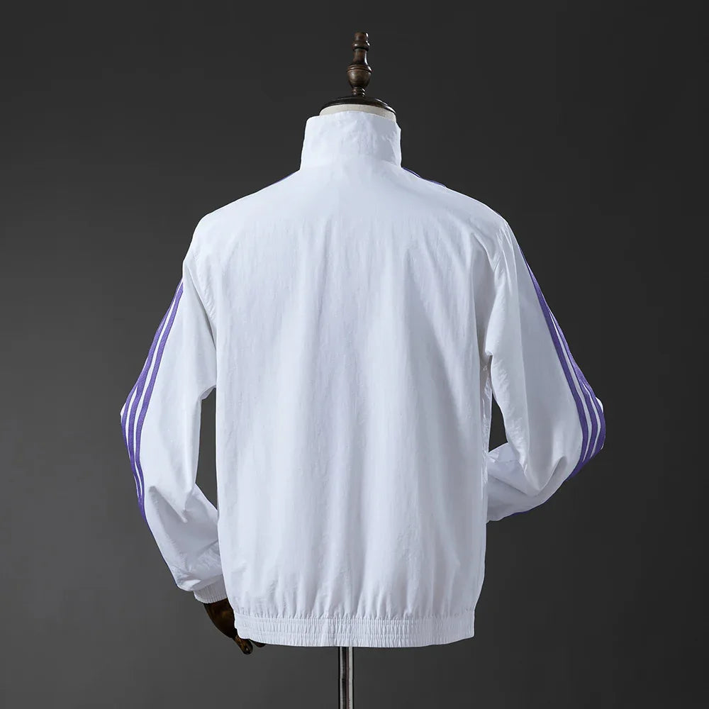 CORTAVIENTO REAL MADRID II REVERSIBLE 2025 - ZonaCamisetas