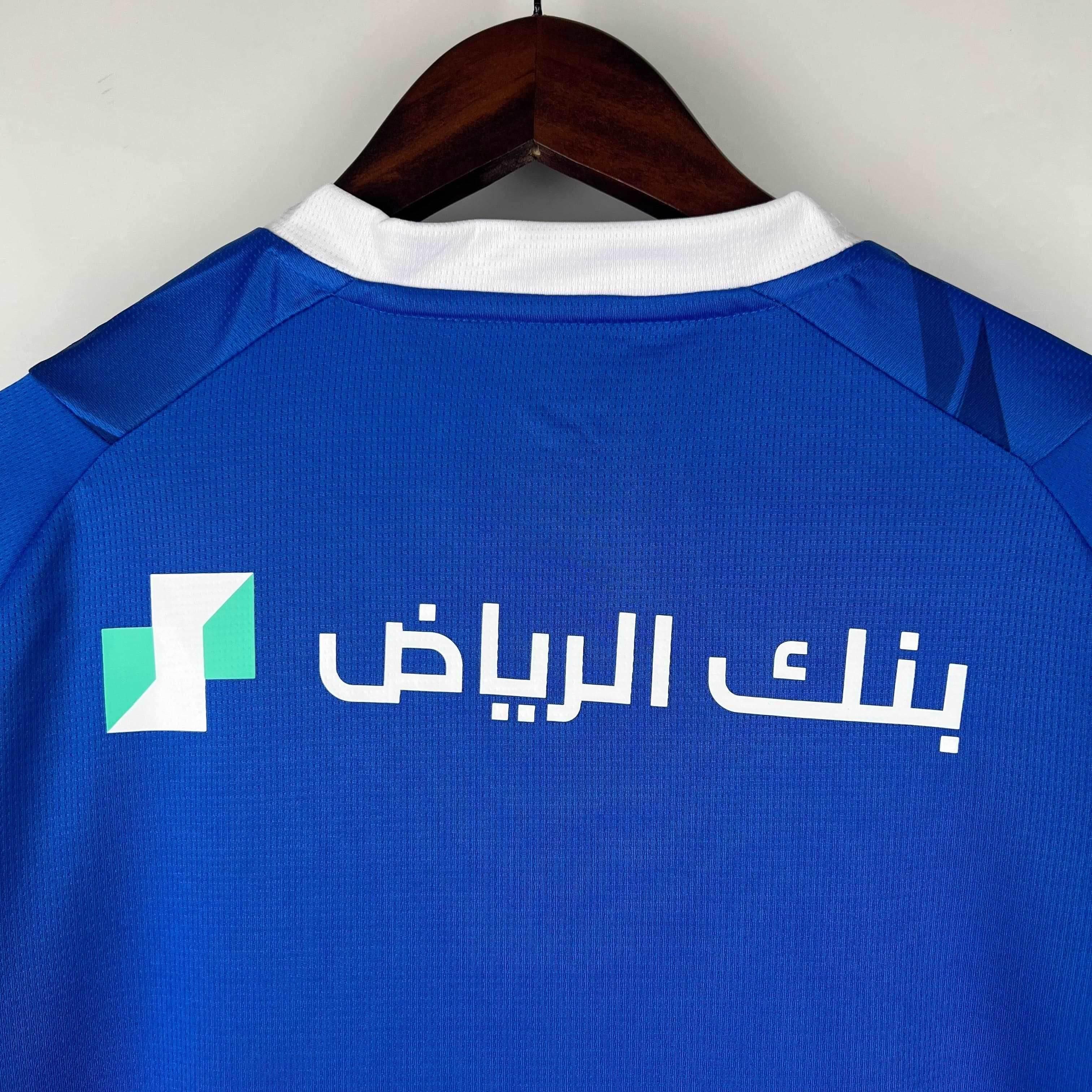 CAMISETA AL HILAL I 23/24 HOMBRE (VERSIÓN FAN) - ZonaCamisetas