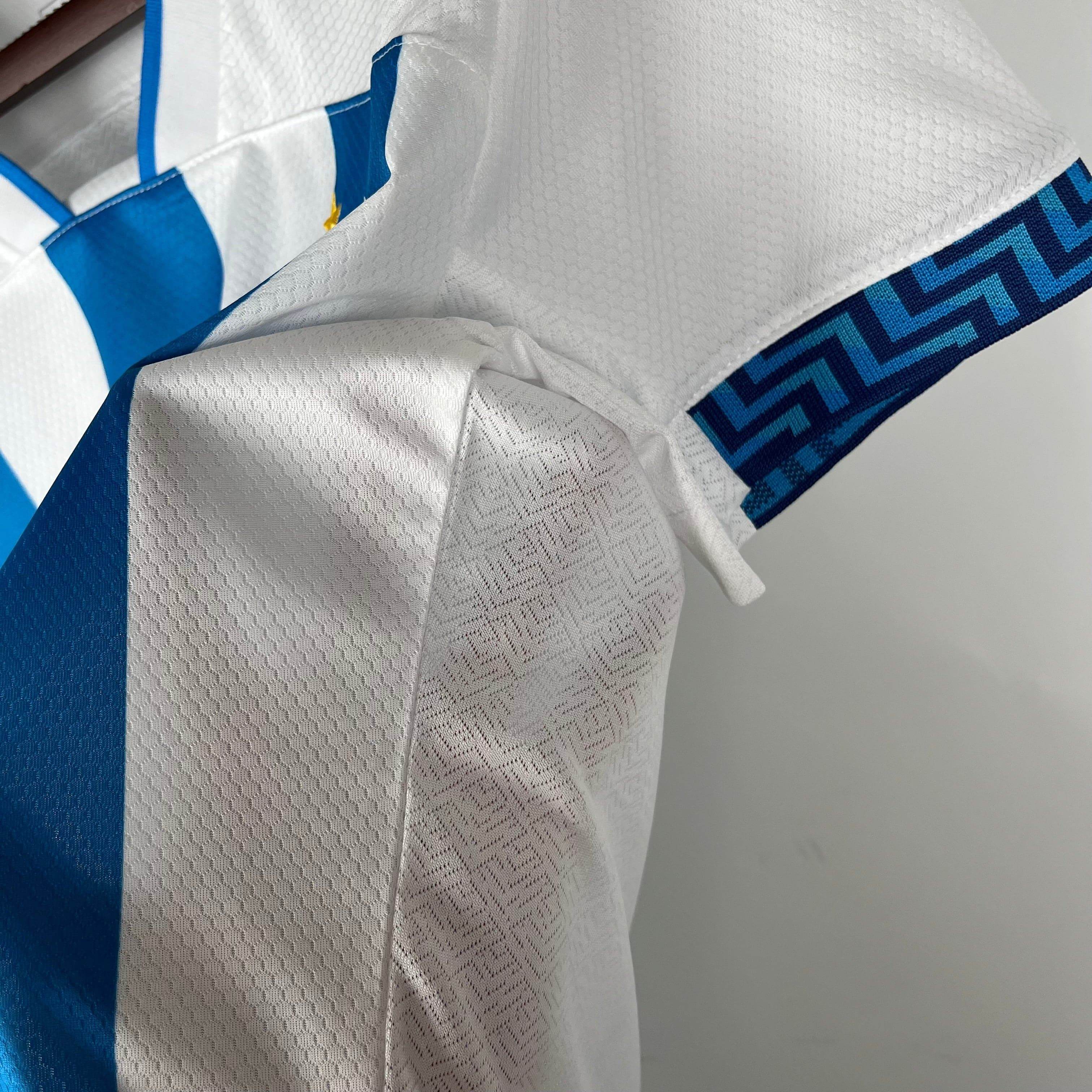 CAMISETA PAYSANDU l 23/24 MUJER (VERSIÓN FAN) - ZonaCamisetas