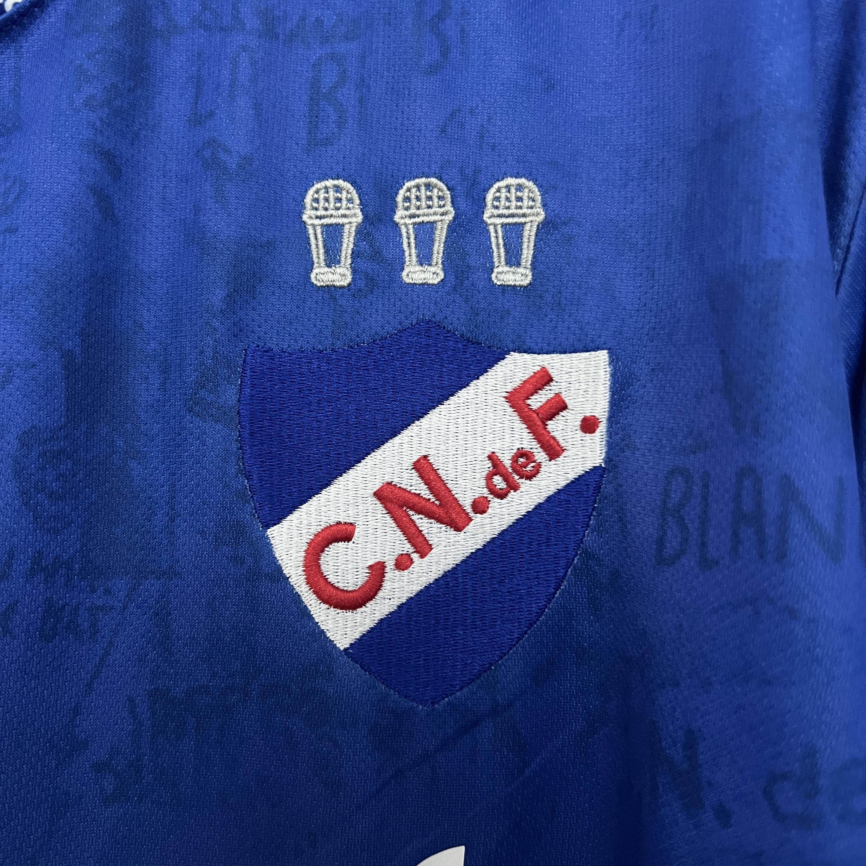 CAMISETA NACIONAL DE MONTEVIDEO I 24/25 HOMBRE (VERSIÓN FAN) - ZonaCamisetas