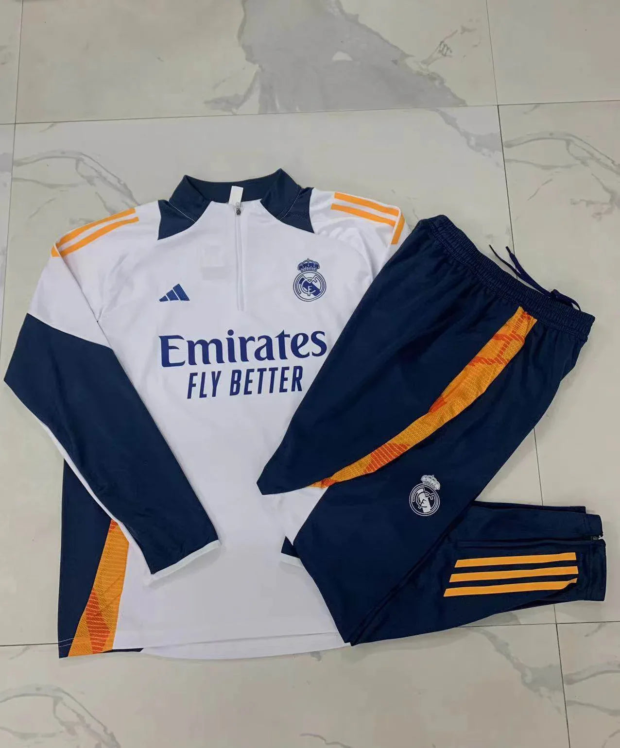 CONJUNTO LARGO REAL MADRID I 24/25 HOMBRE - ZonaCamisetas
