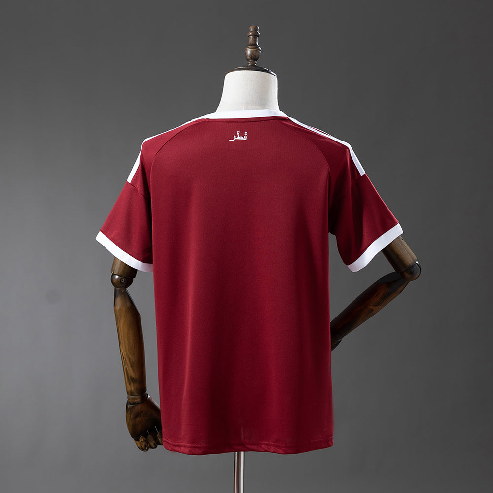 CAMISETA QATAR I 2026 HOMBRE (VERSIÓN FAN)