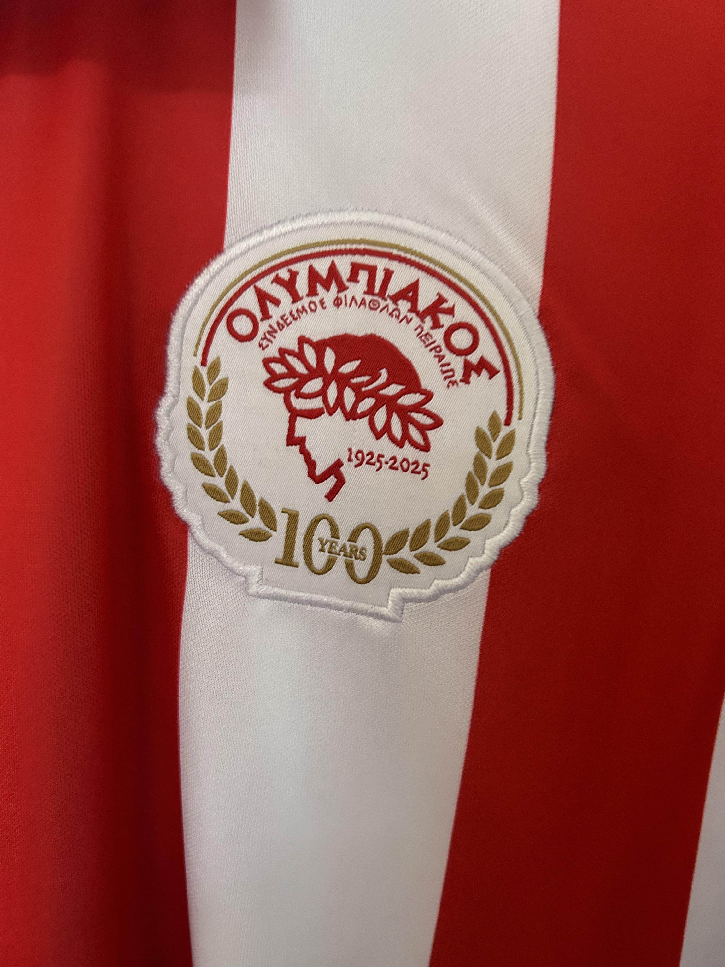 CAMISETA OLYMPIAKOS I 100th HOMBRE (VERSIÓN FAN) - ZonaCamisetas