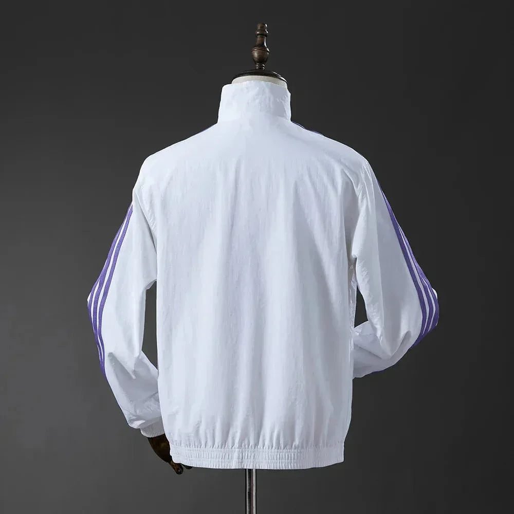 CORTAVIENTO REAL MADRID II REVERSIBLE 2025 - Zona Camisetas