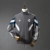 CORTAVIENTO REAL MADRID lI 24/25 - Zona Camisetas