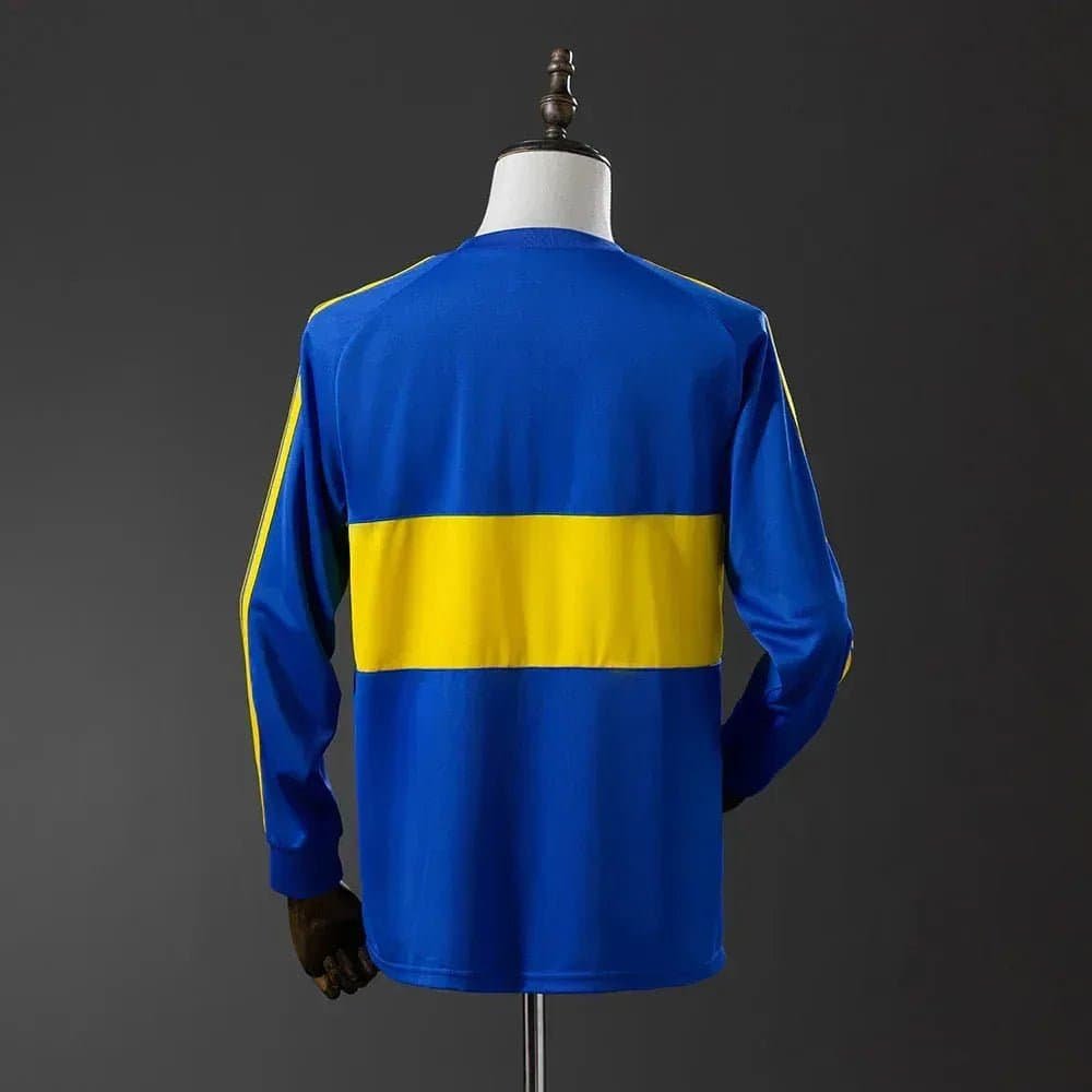 EC44102C-EAED-4836-8A24-6DE20B856785_07250544-8281-4bff-aa14-7880f428da0a CAMISETA BOCA JUNIORS I 1981 HOMBRE MANGA LARGA (RETRO) - Zona Camisetas