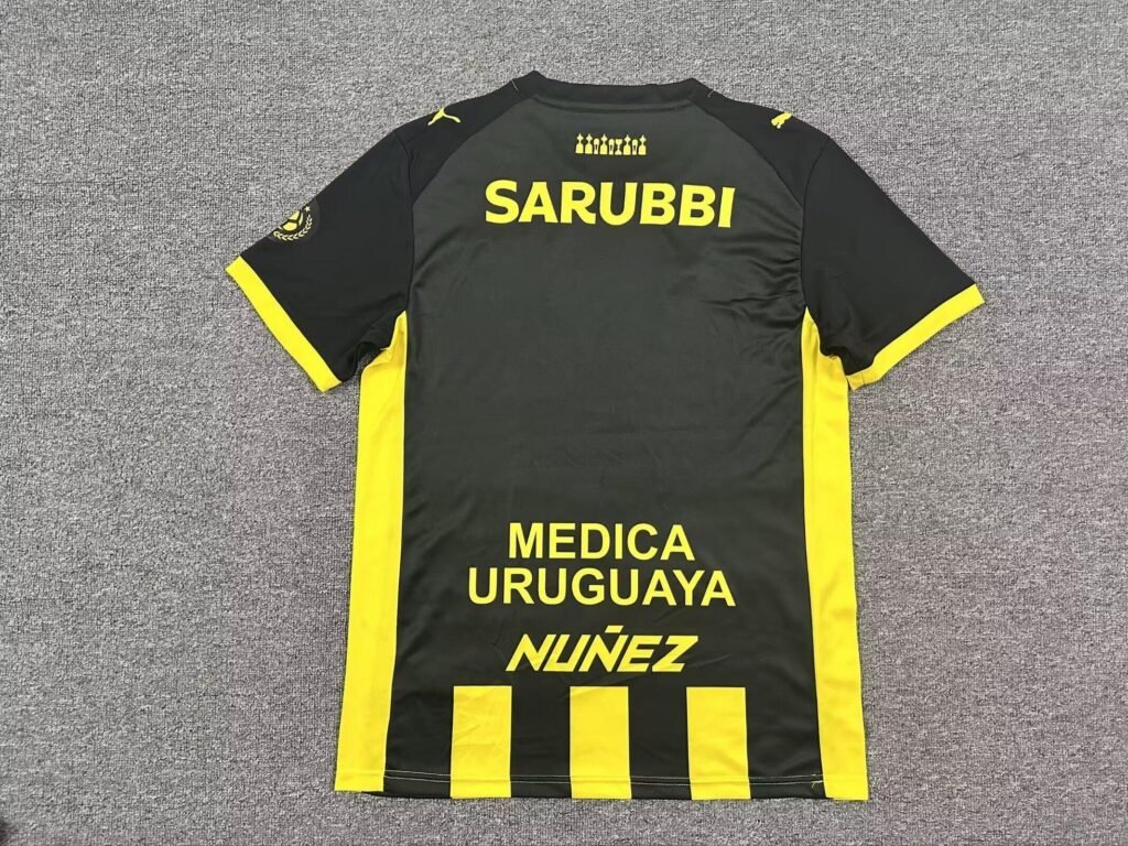 IMG-6397_82bd44ba-ed12-44a4-a394-2c9e13c7d14e CAMISETA PEÑAROL I 26/27 HOMBRE (VERSIÓN FAN) - Zona Camisetas