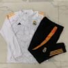 c82f81da_27635fda-05ff-4265-882f-12dc87a8c7b8 CONJUNTO LARGO REAL MADRID l 24/25 HOMBRE - Zona Camisetas