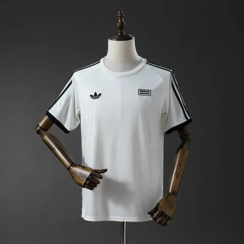 ebe3f89b_2970c94b-b340-45af-86d6-93980a9cbde2 CAMISETA ADIDAS OASIS TOUR V 25/26 HOMBRE (RETRO) - Zona Camisetas